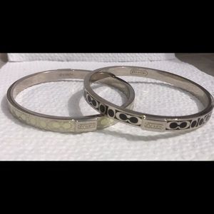 Two coach bracelets